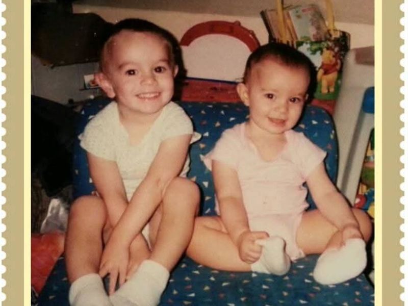 Two babies sitting together