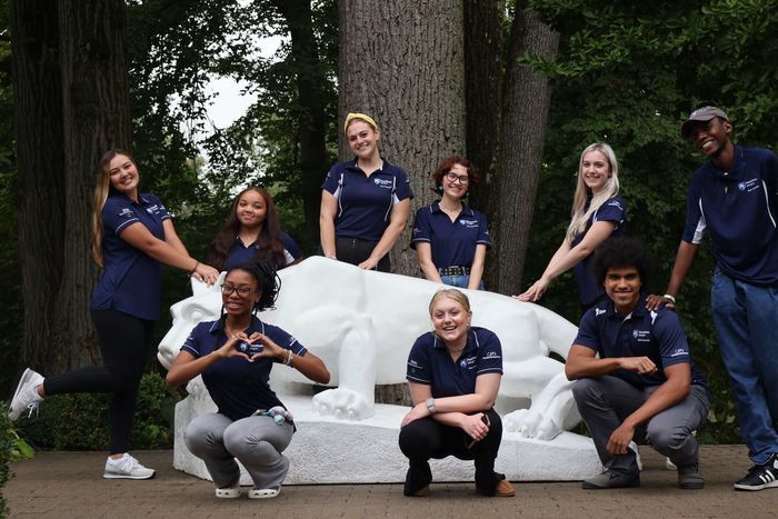 Peer counselors around the lion shrine