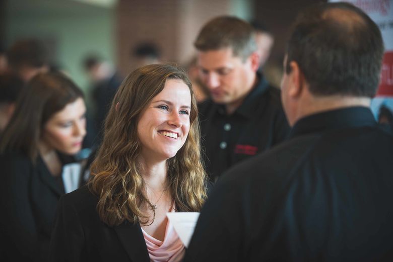 student talking to employer 