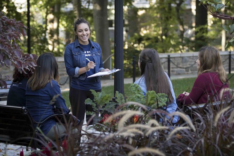 students talking outside