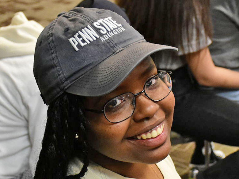 student smiling at camera