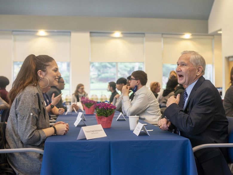 Donor event with two people talking