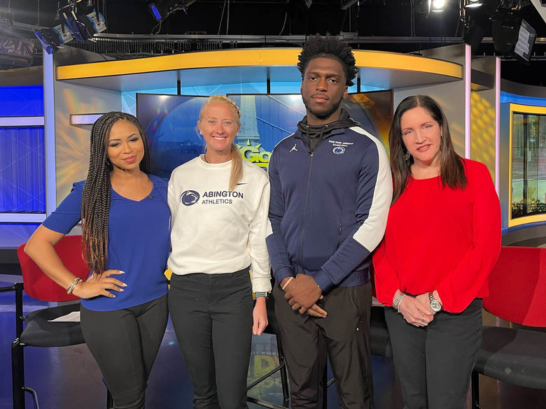 Dr. Karen Gould and two students pose for a photo in the fox29 news room