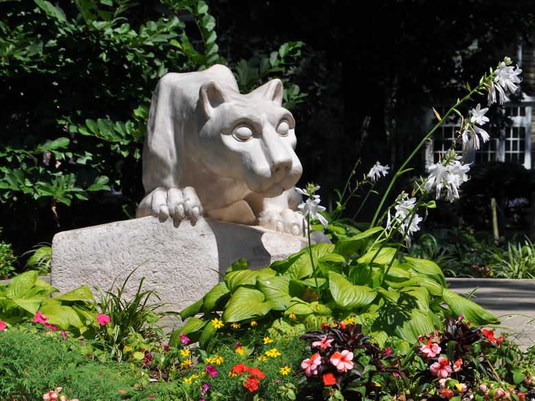 Lion Shrine surrounded by flowers