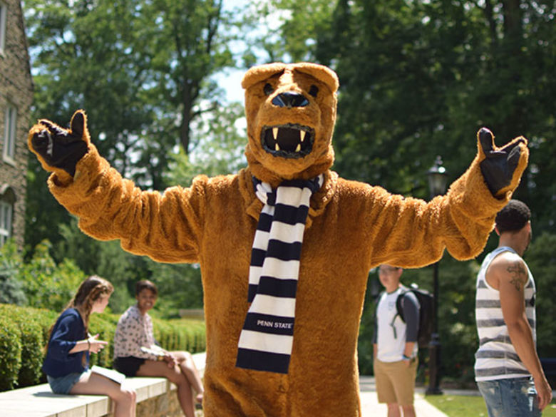 Nittany lion mascot with arms expanded