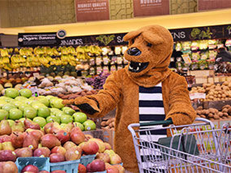 Nittany Lion at the Grocery Store picking up apples