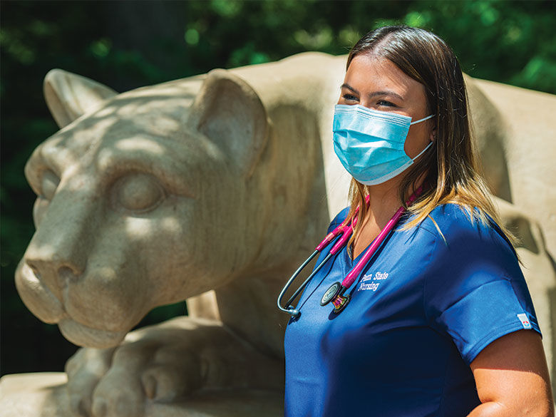 masked nurse at Lion Shrine