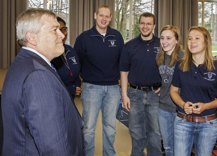 Penn State President Eric Barron talks to a group of students