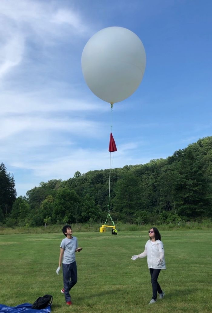 students testing weather balloons payloads 