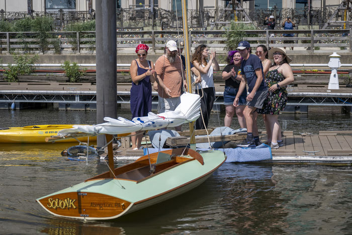 Penn State Abington students putting the duckboat Squonk into the water
