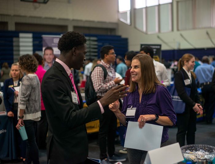 Student talking to employer at the Career Fair