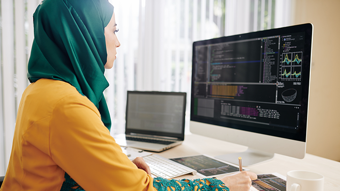 student sitting at computer