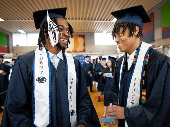 Two Penn State Abington student athletes celebrate their graduation
