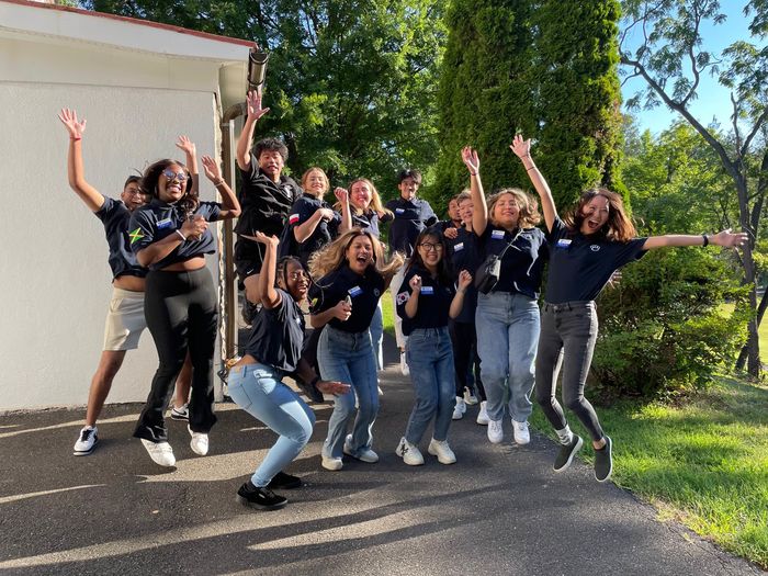 Students jumping in air 