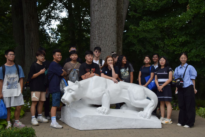 group photo in front of Lion Shrine