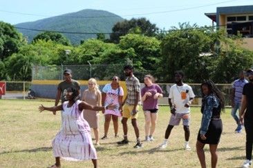 A group of students playing a game outside