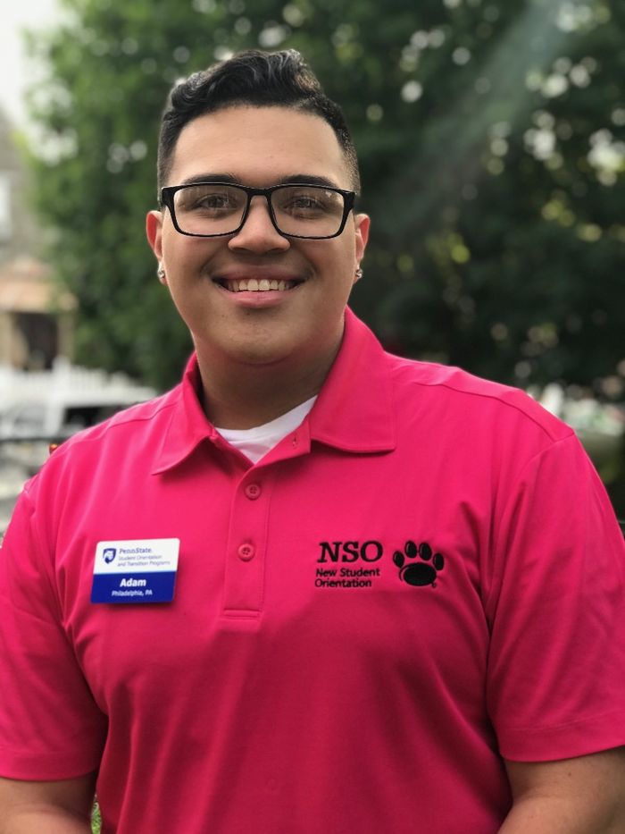 Adam Romero appears in his pink orientation uniform. 