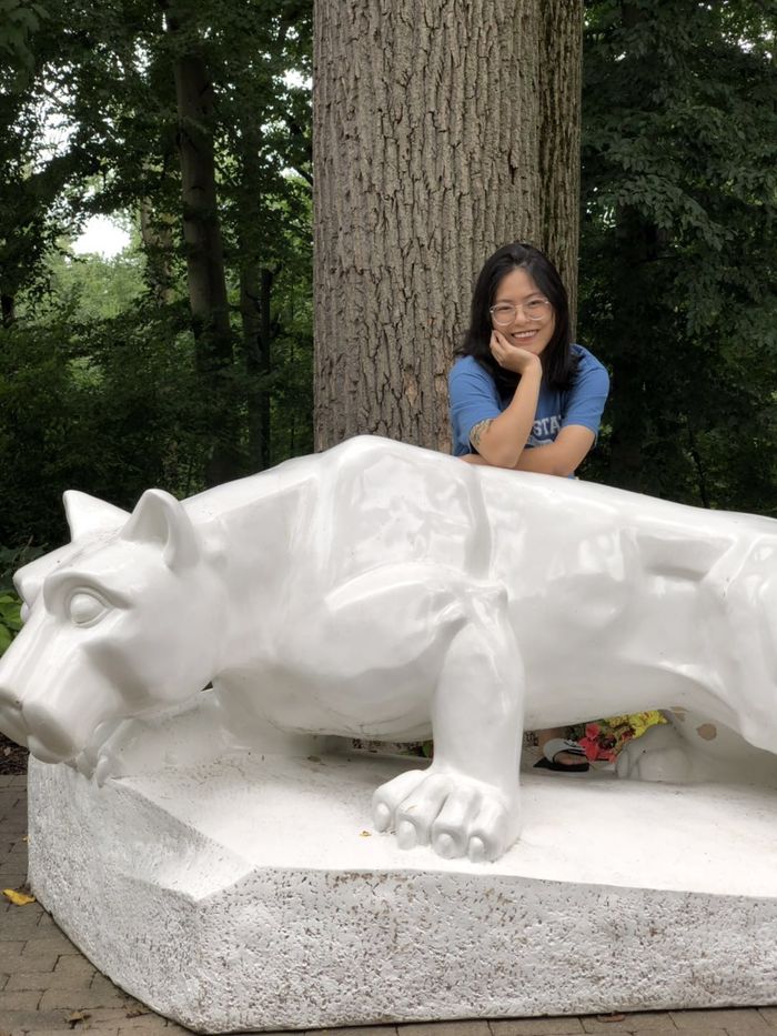 Bingxin Zhang with Lion