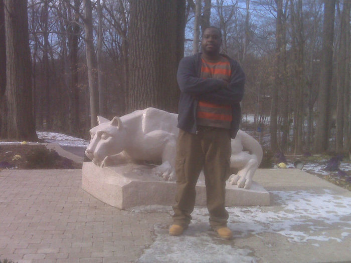 Vernon Walker in front of the Lion Shrine at Penn State Abington
