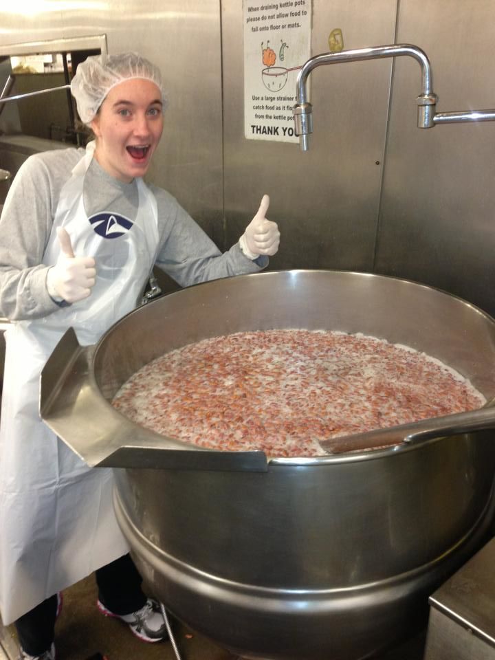 Abington student with a pot of beans