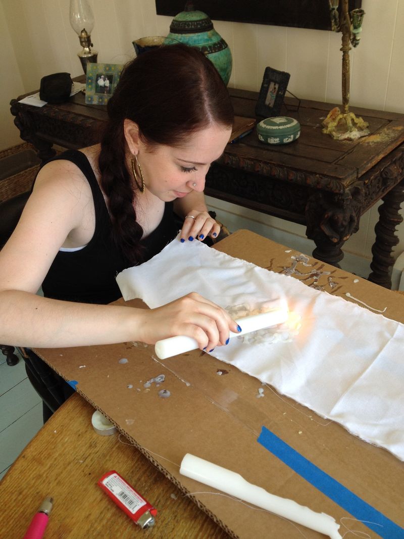 Susan Stanton practices print making at an art residency.