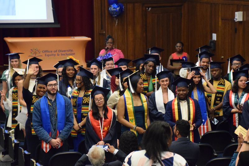 cultural graduation students standing