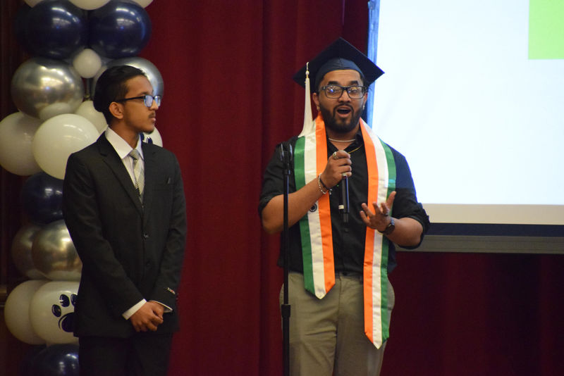 student speaking on stage