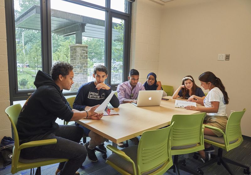 Group of students in Penn State Abington Lions Gate study lounge near Philadelphia