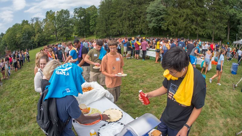 large crowd of students lined up to get food