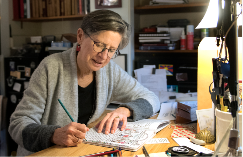 Susan Squier working on her comics journal