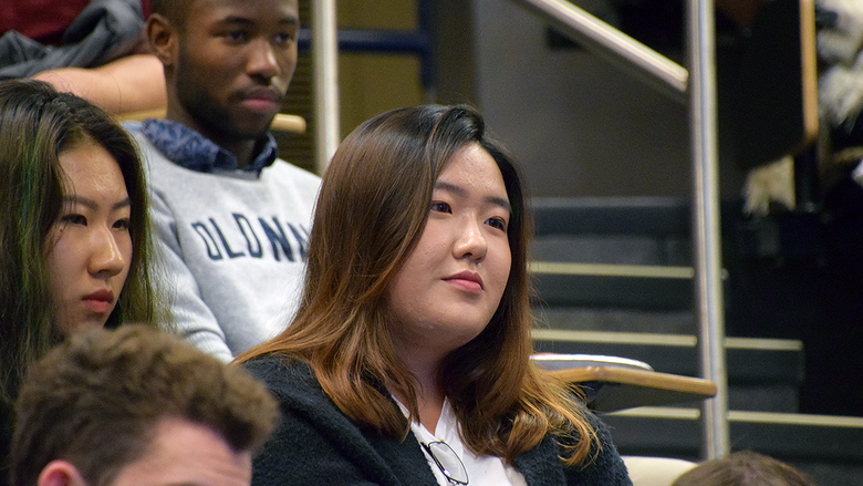 Woman student in audience