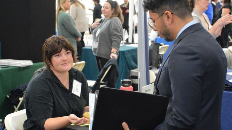 Recruiter and Penn State Abington student at the fall 2023 career fair