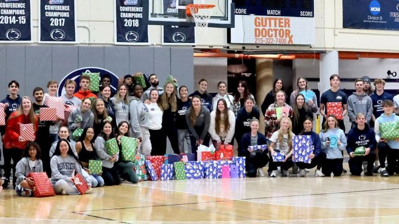 Penn State Abington student athletes wrapped gift for a family in need