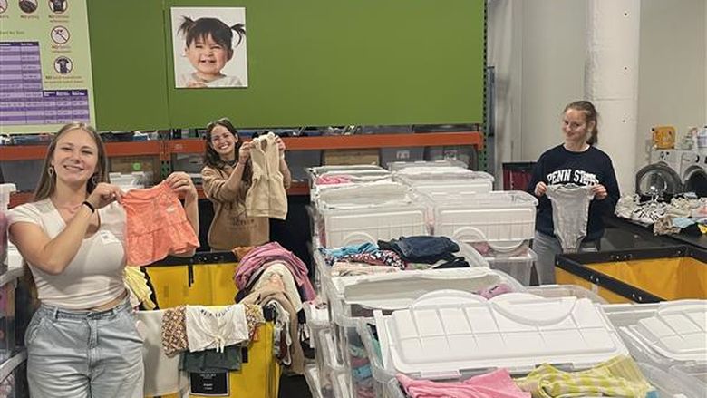 students sorting clothes