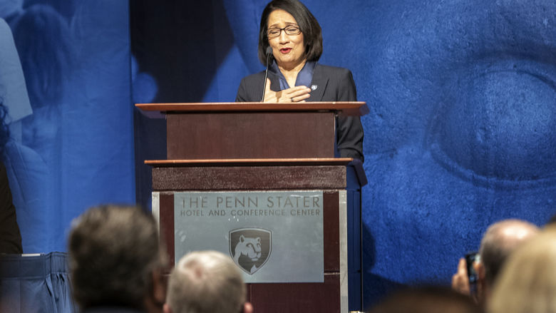 Bendapudi at podium thanking trustees