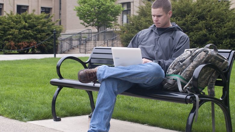 Student studying outside Burrows