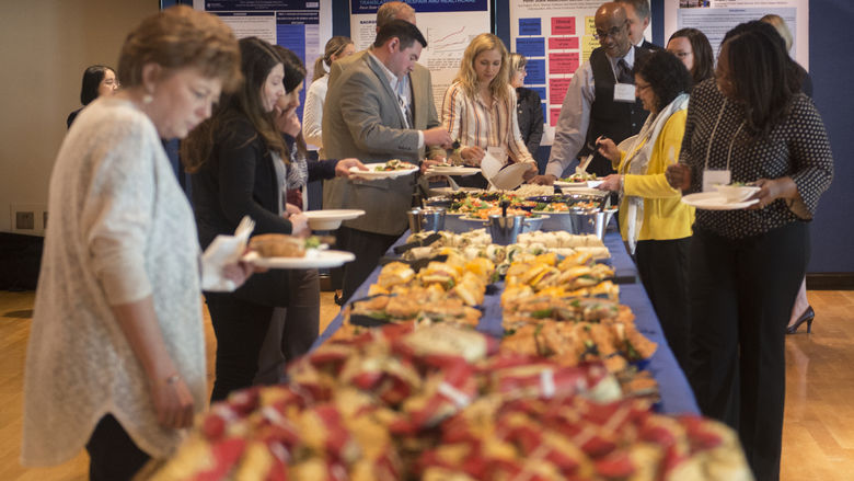Conference attendees at lunch