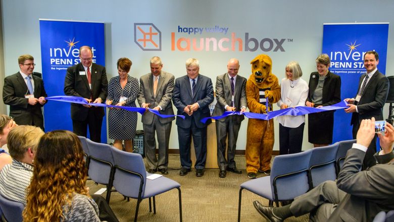 President Barron and guests do ceremonial ribbon cutting for Happy Valley LaunchBox