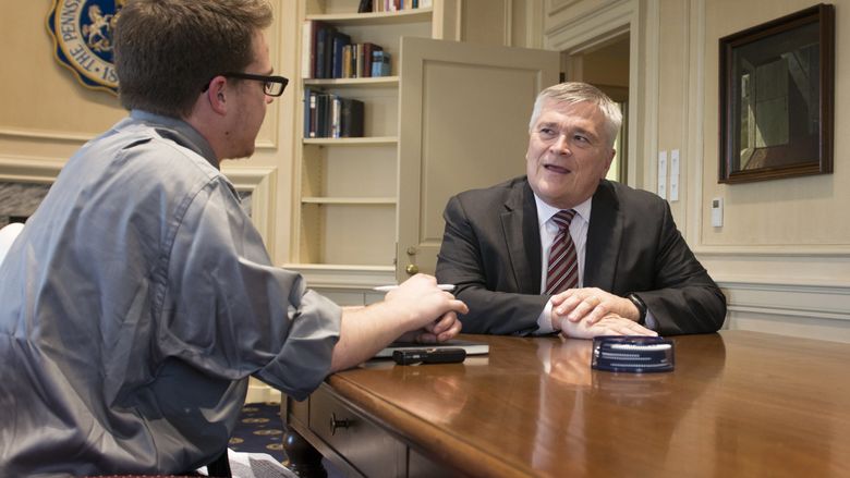 President Barron with Collegian reporter