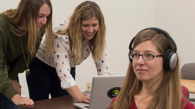 Three researchers in new Acoustics Lab