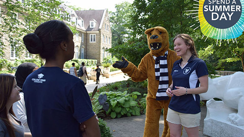students at shrine with lion