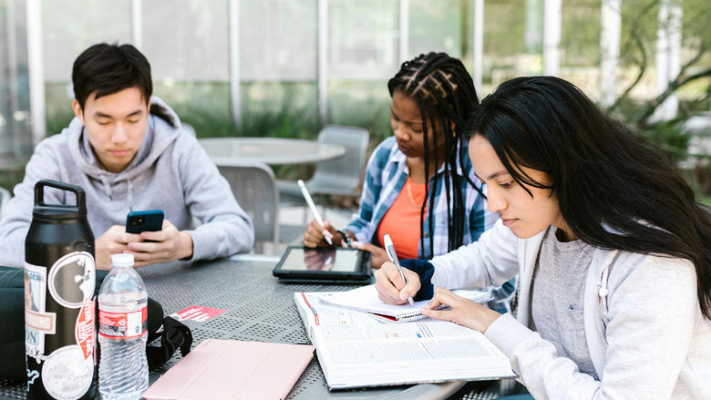 Students studying at a table