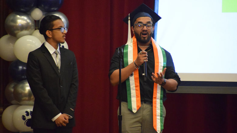 student speaking on stage