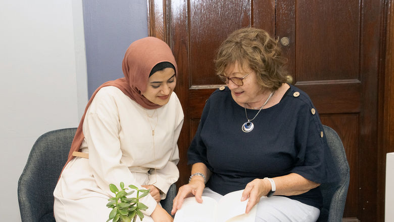 Student and Mentor talking