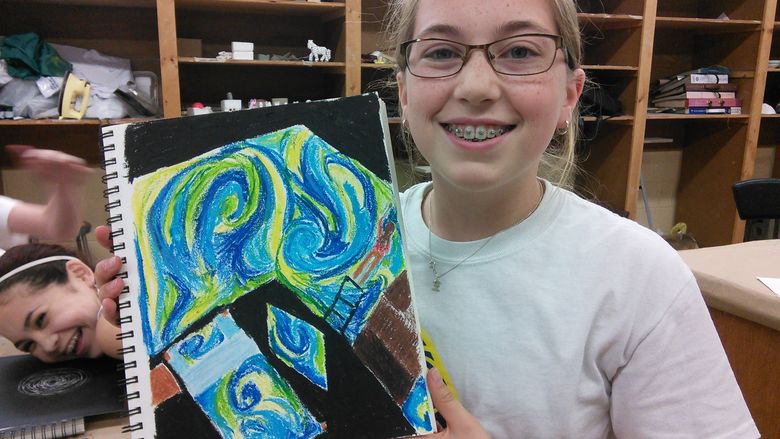 Student with artwork