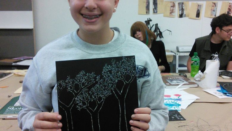 Student with artwork