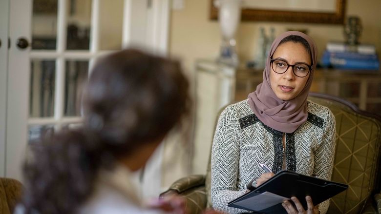 Student talking to a counselor 