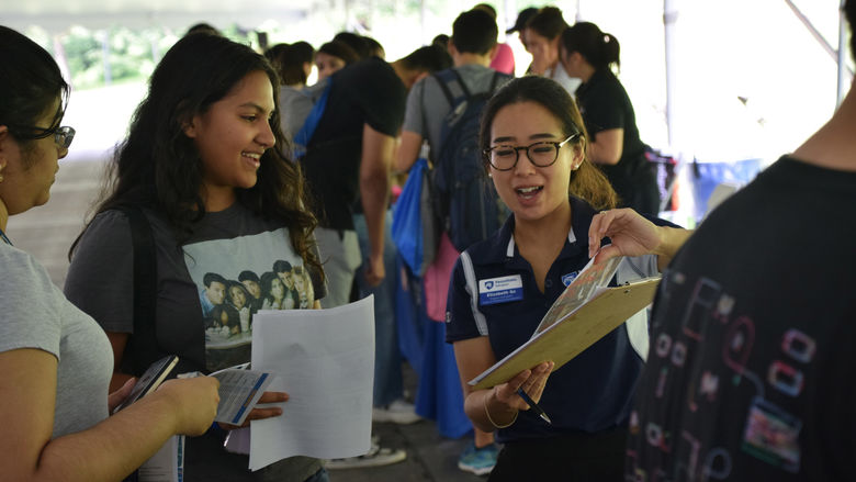 Penn State Abington (near Philadelphia) student talking to a staff member 
