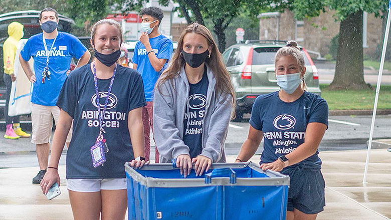 three student helpers at Lions Gate