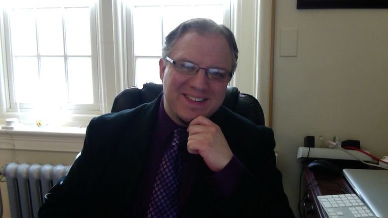 Ron Costello in his office